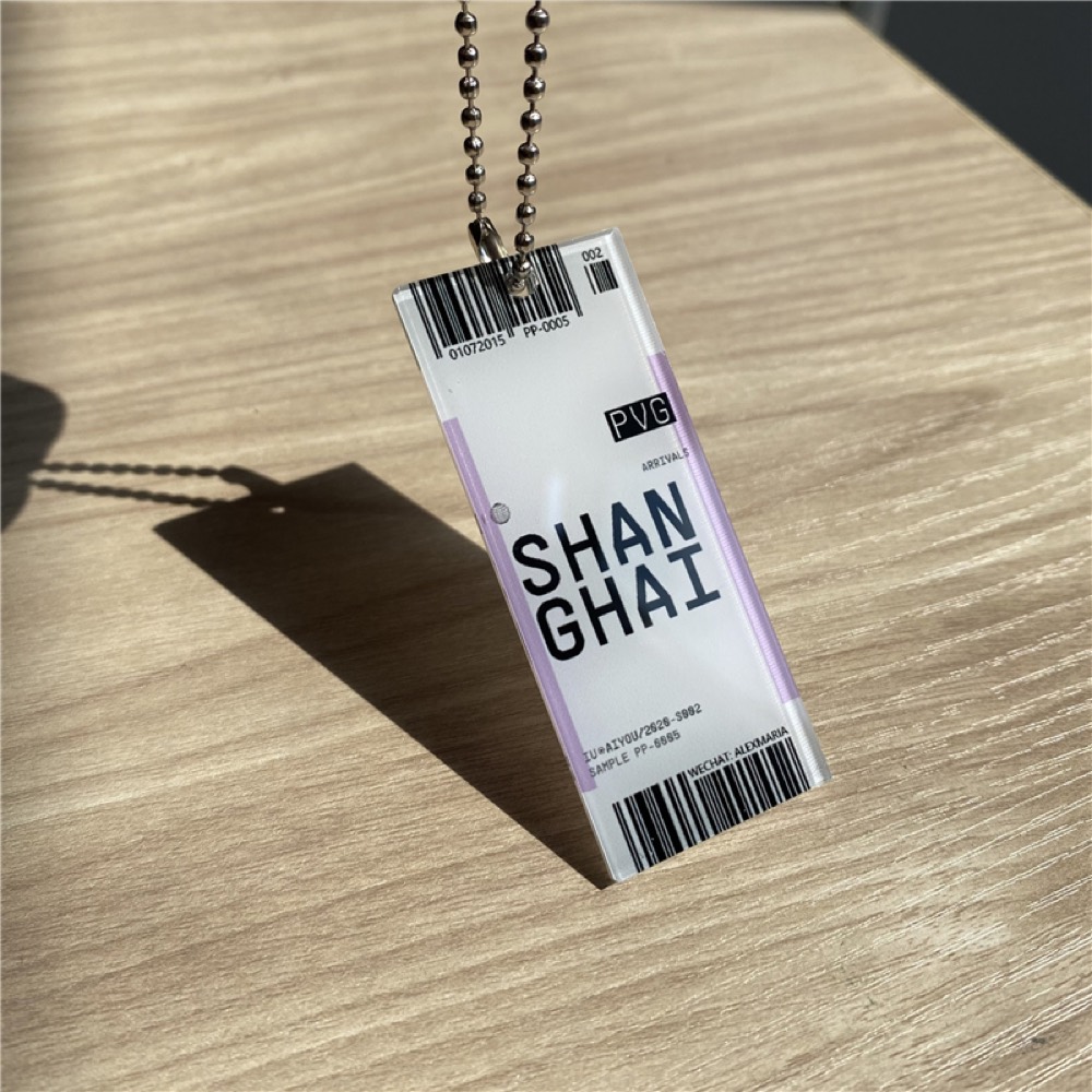 Rectangular acrylic keychain printed with a Shanghai luggage-tag design, on a ball chain