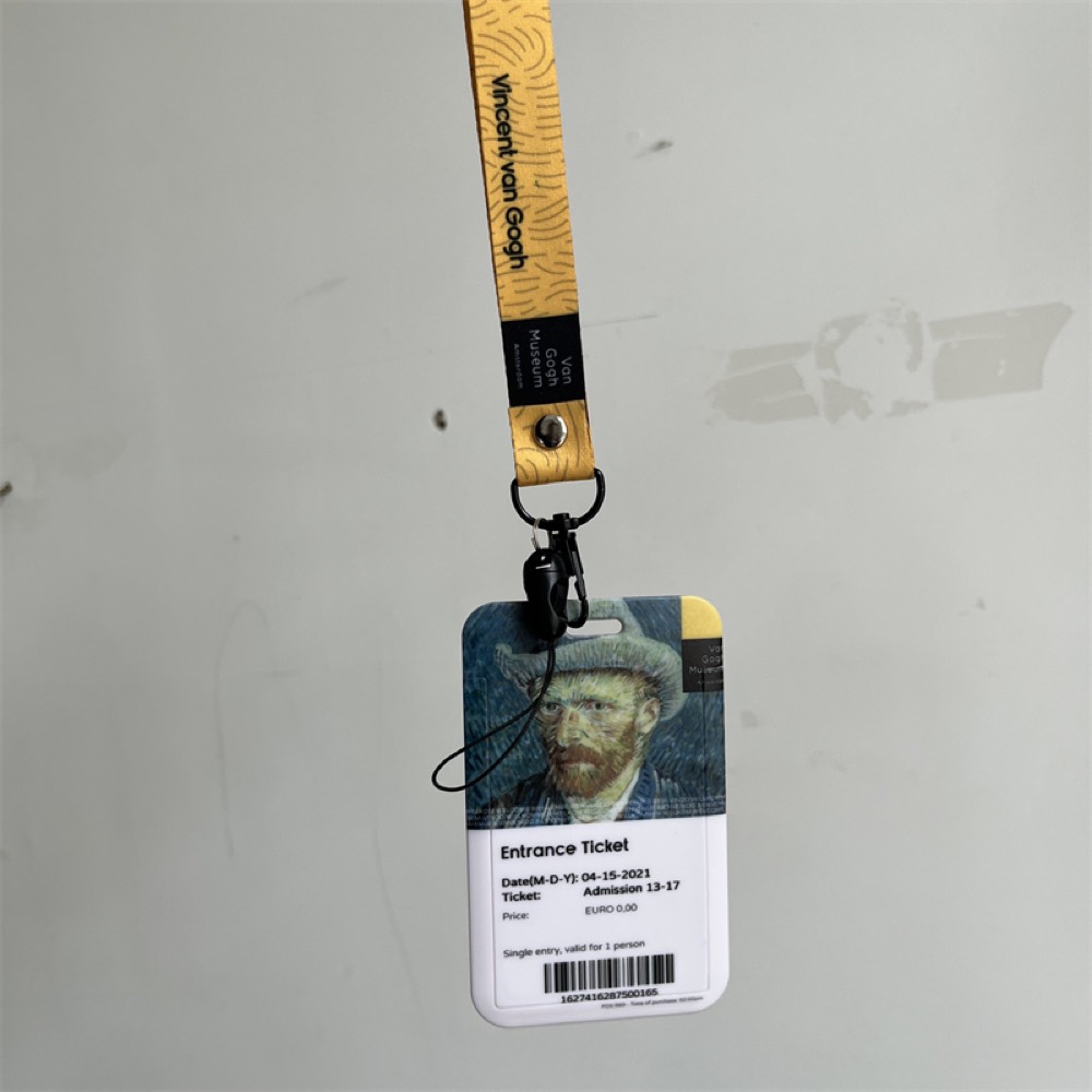 Card-shaped acrylic keychain with Van Gogh museum ticket artwork on a printed lanyard